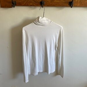 Large cream turtleneck